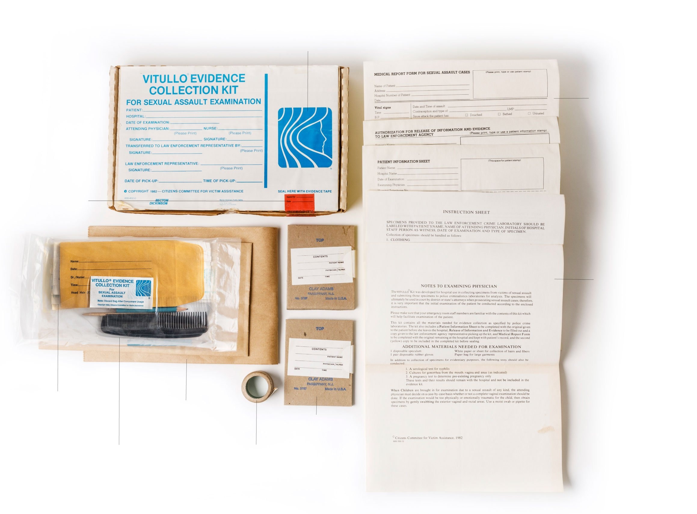 A Vitullo evidence collection kit for sexual assault examination, unpacked with its paperwork and swabs.